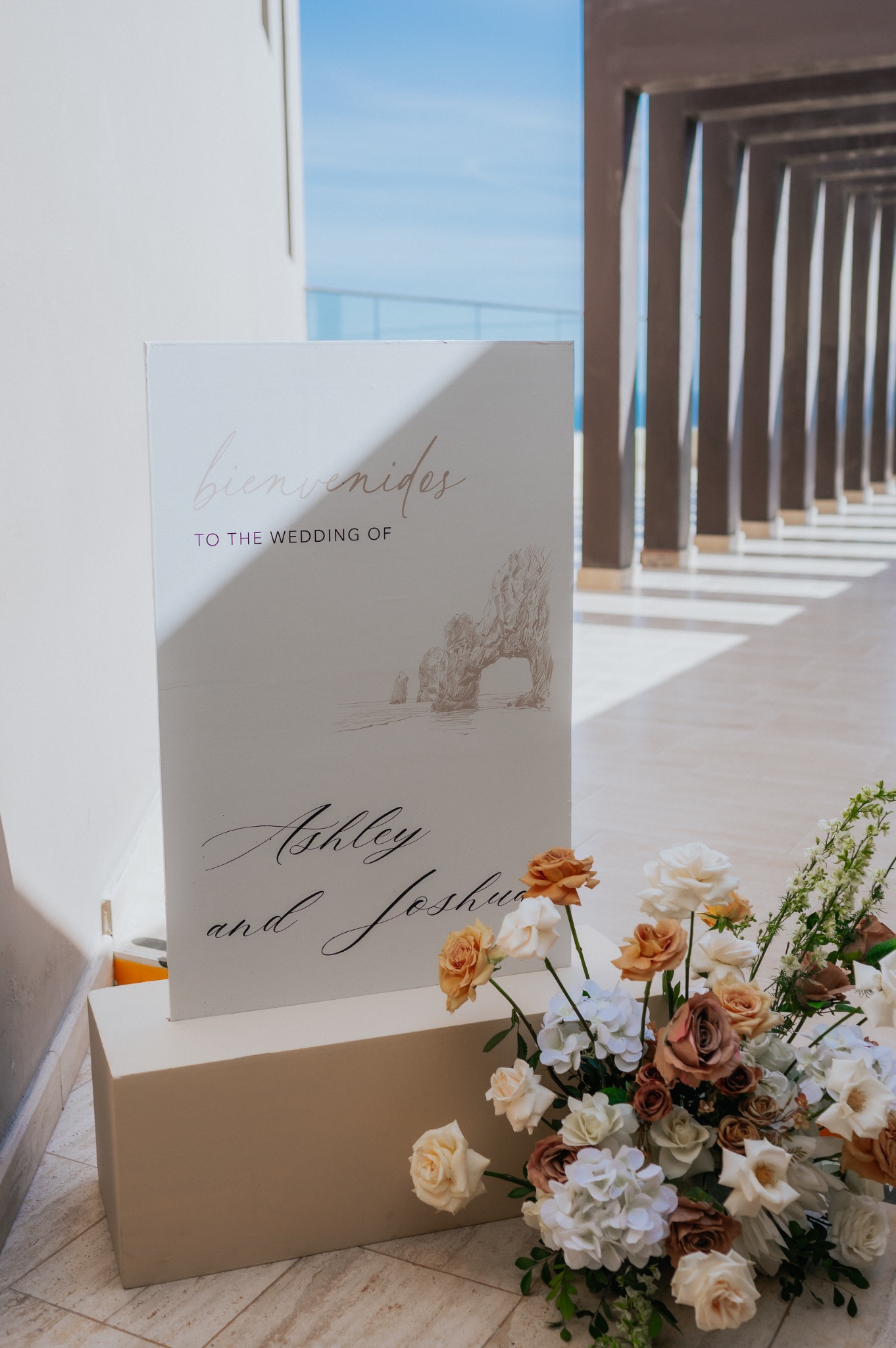 Destination wedding welcome sign and floral installation